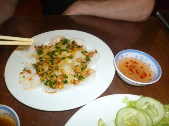 Banh beo: soft rice pancakes topped with crispy shrimps, shallots and chives