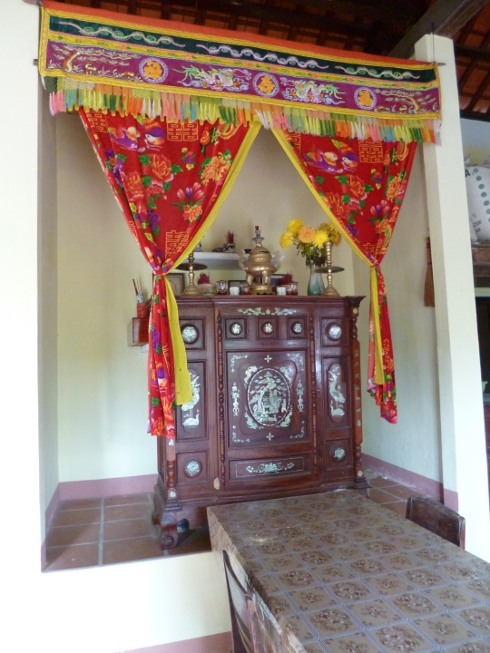 A small family shrine at Mr Phong's home, where dead members of the family are honoured